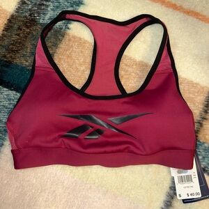 Reebok New with tags Sports Bra size small Lux Vector Race berry color